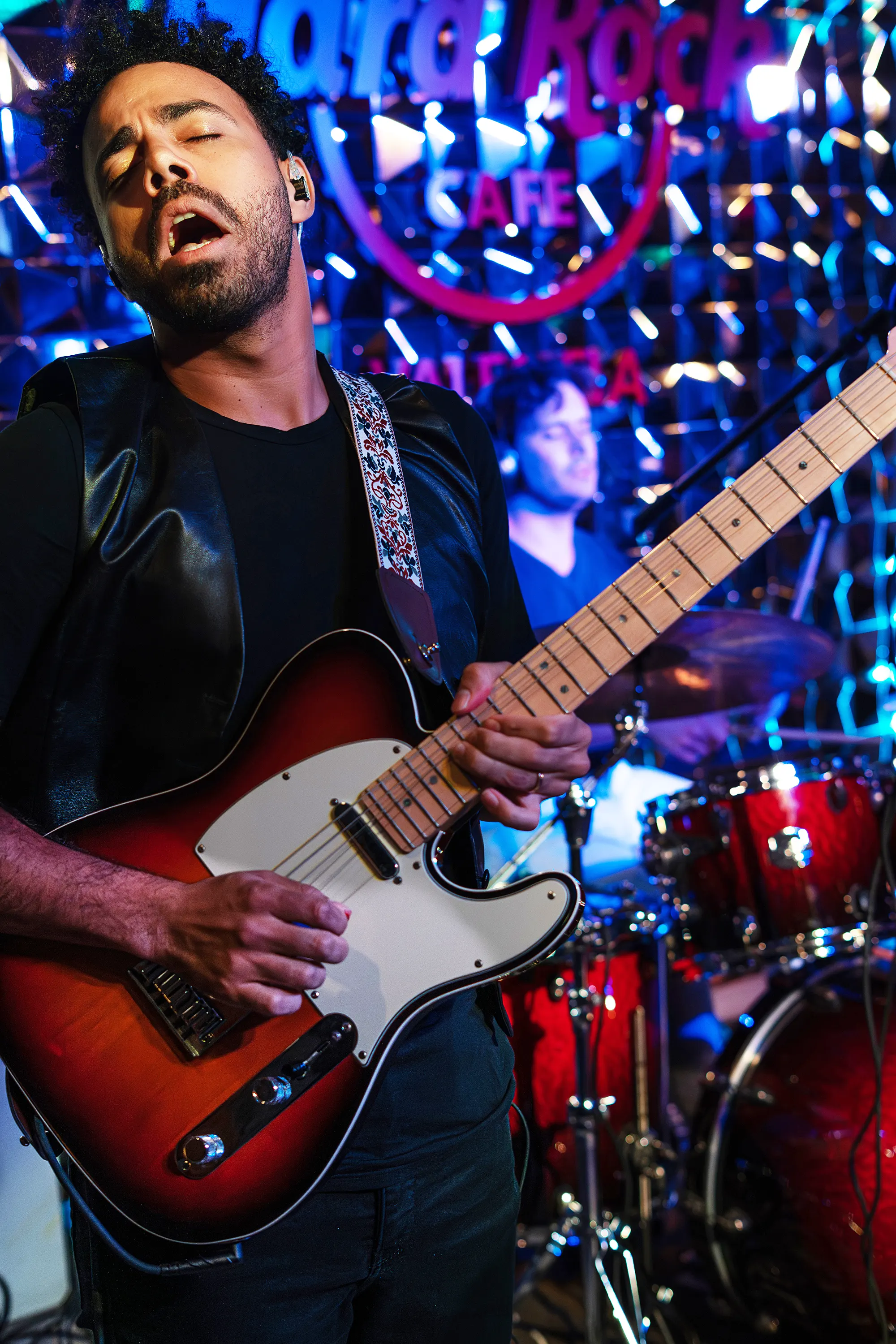OTAVA guitarist performing live